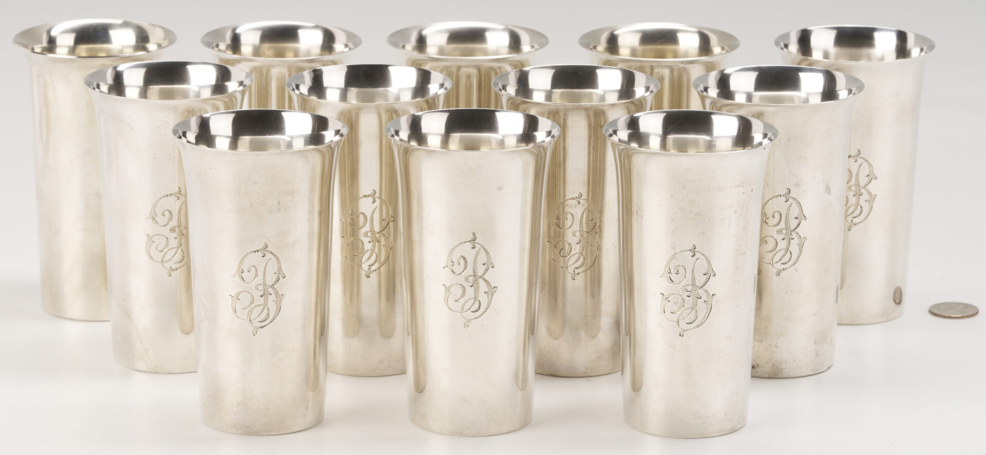 Lot 814: 12 Sterling Silver Highball Glasses