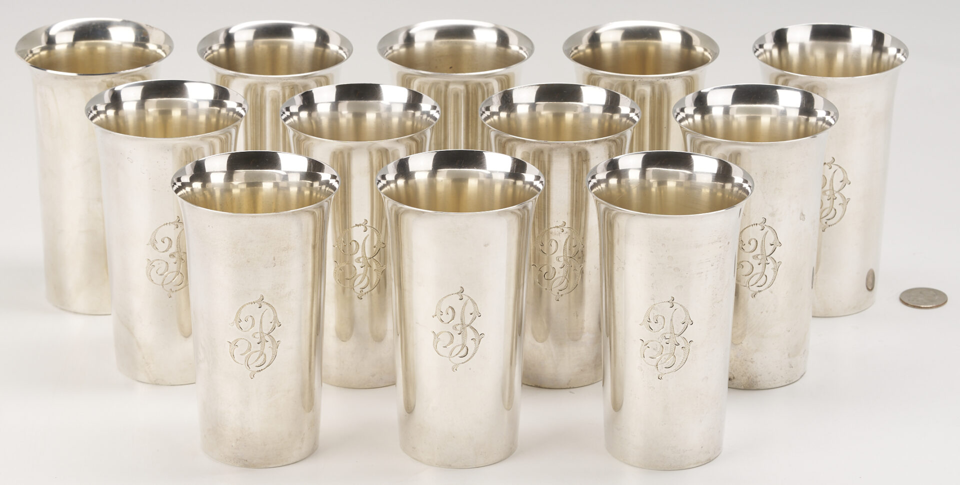 Lot 814: 12 Sterling Silver Highball Glasses