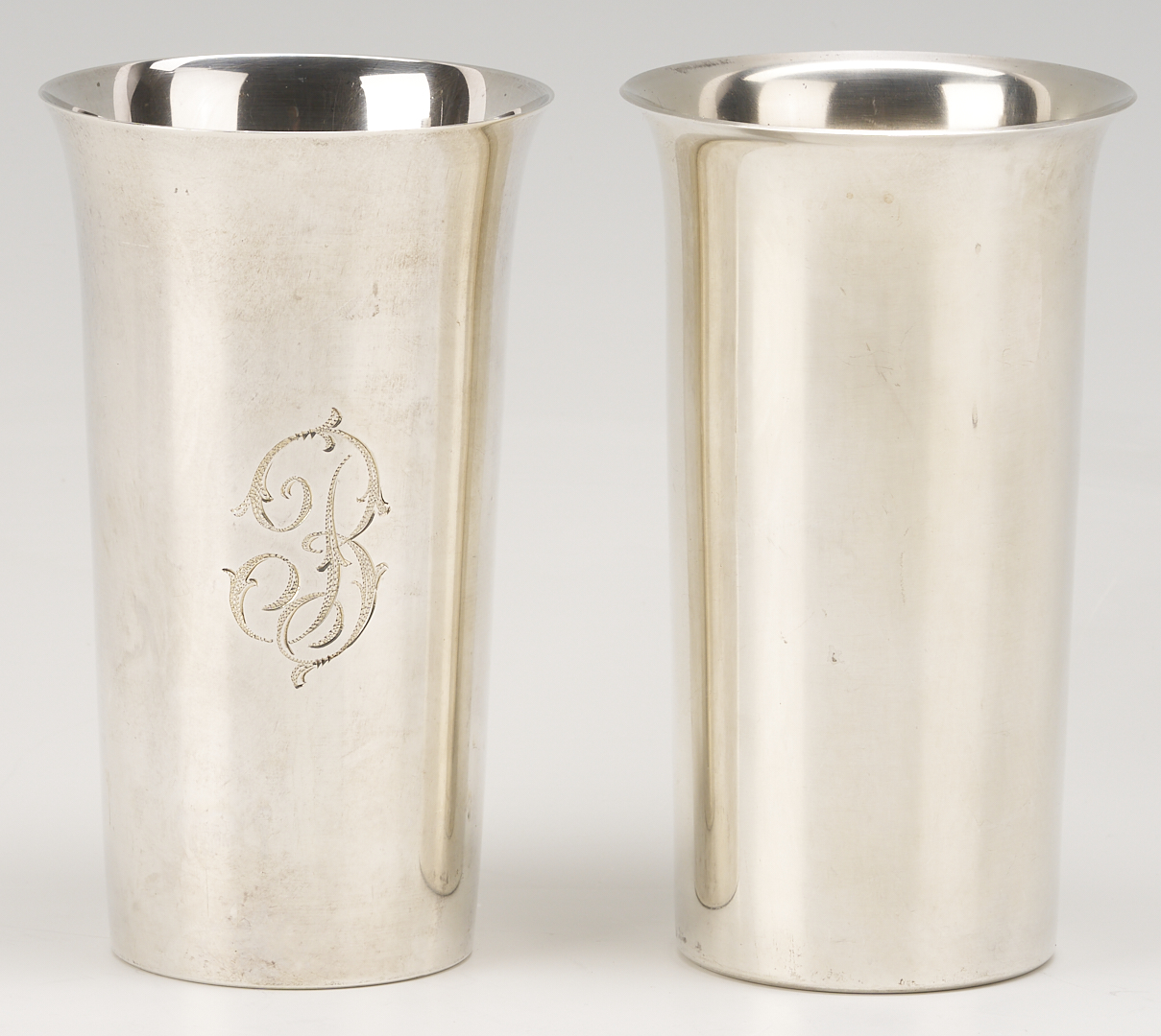 Lot 814: 12 Sterling Silver Highball Glasses