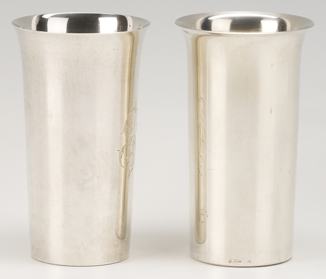 Lot 814: 12 Sterling Silver Highball Glasses