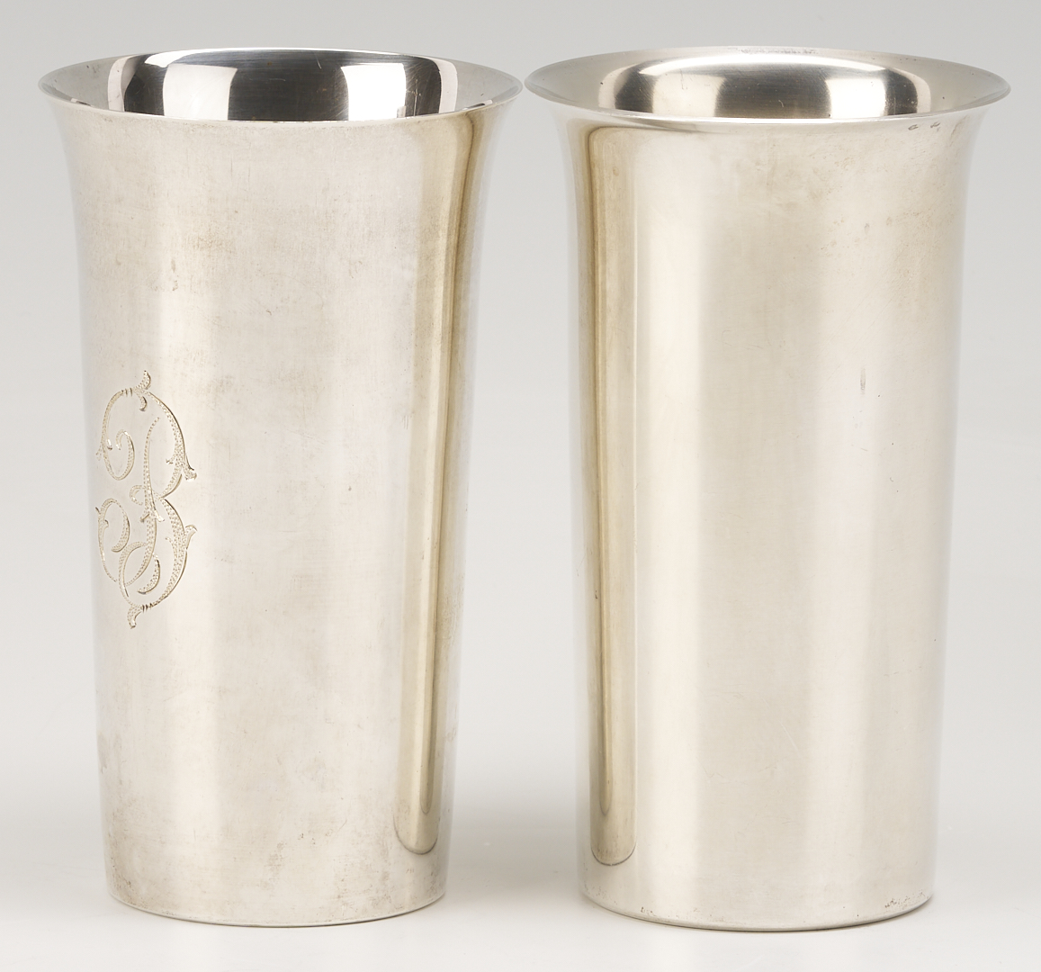 Lot 814: 12 Sterling Silver Highball Glasses