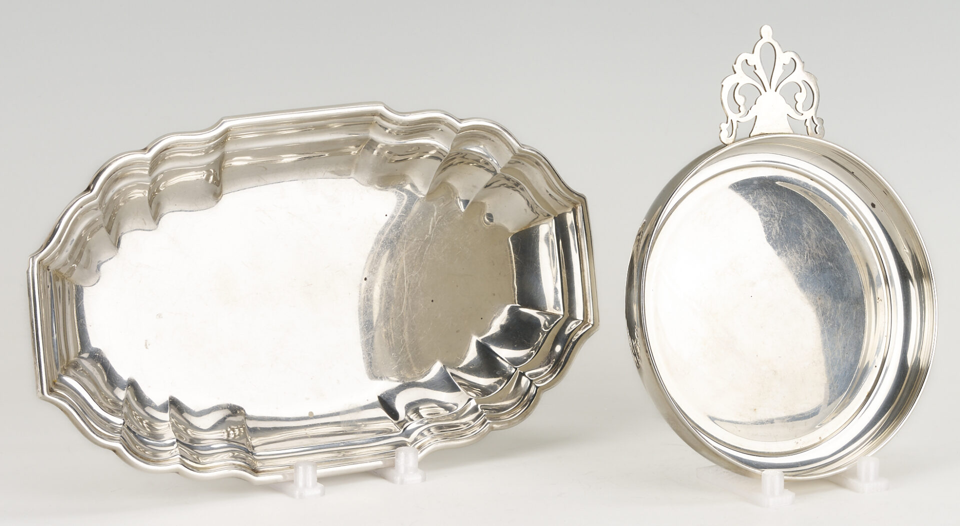 Lot 828: 4 Sterling Silver Items: 2 Plates, 1 Porringer, & 1 Bread Tray