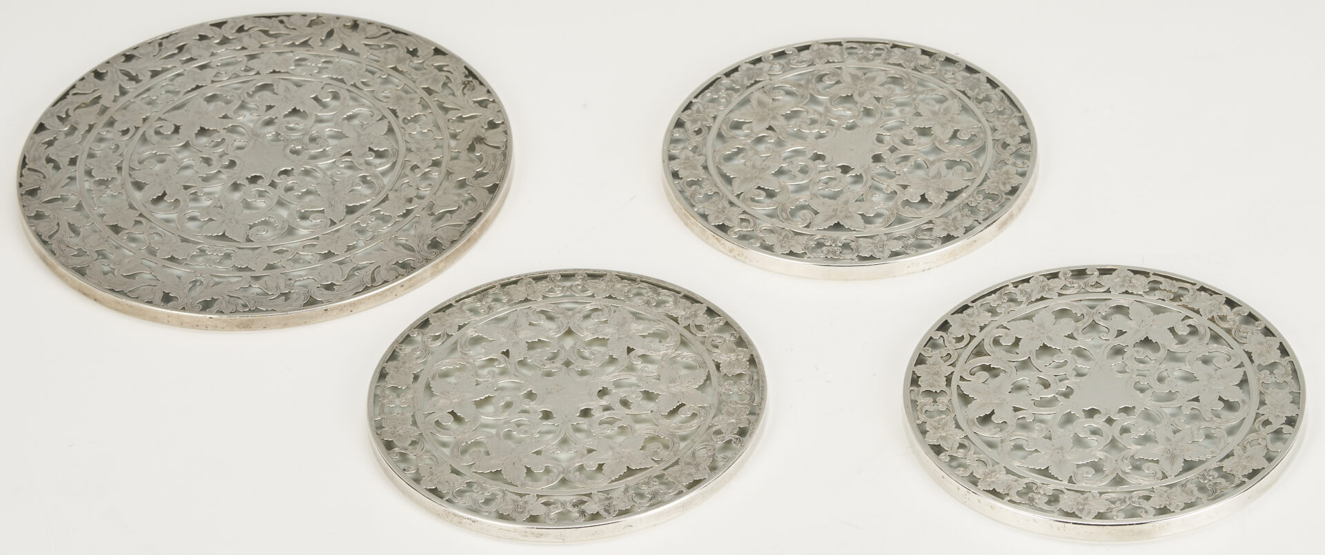 Lot 833: Francis 1 Sterling Silver Serving Bowl & 4 Sterling Overlay Trivets