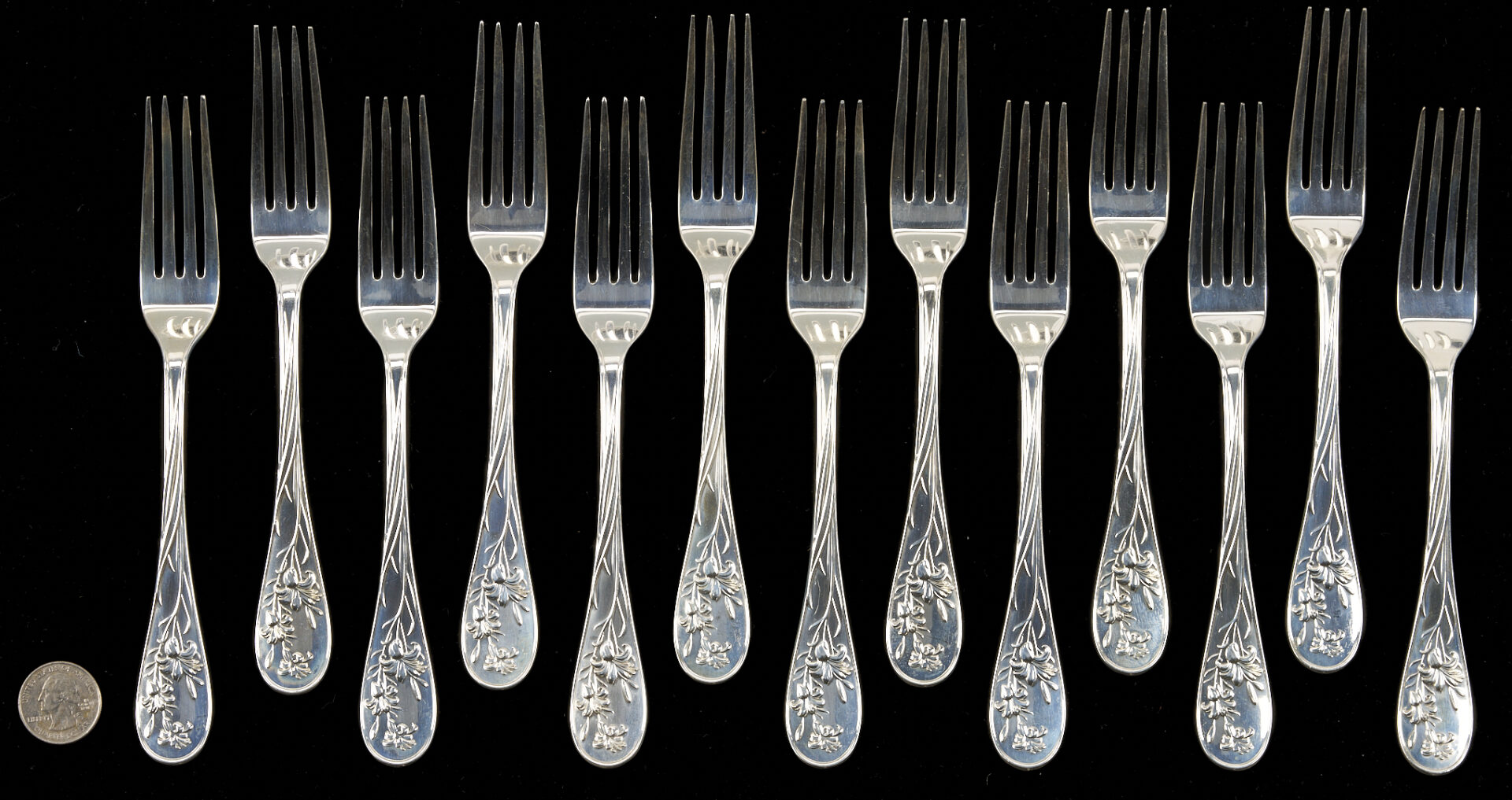 Lot 835: 13 Lunt Sterling Silver Forks, Quintessence Pattern