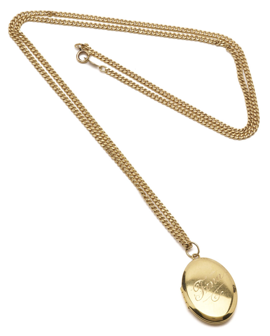 Lot 974: 14K Engraved Locket Necklace
