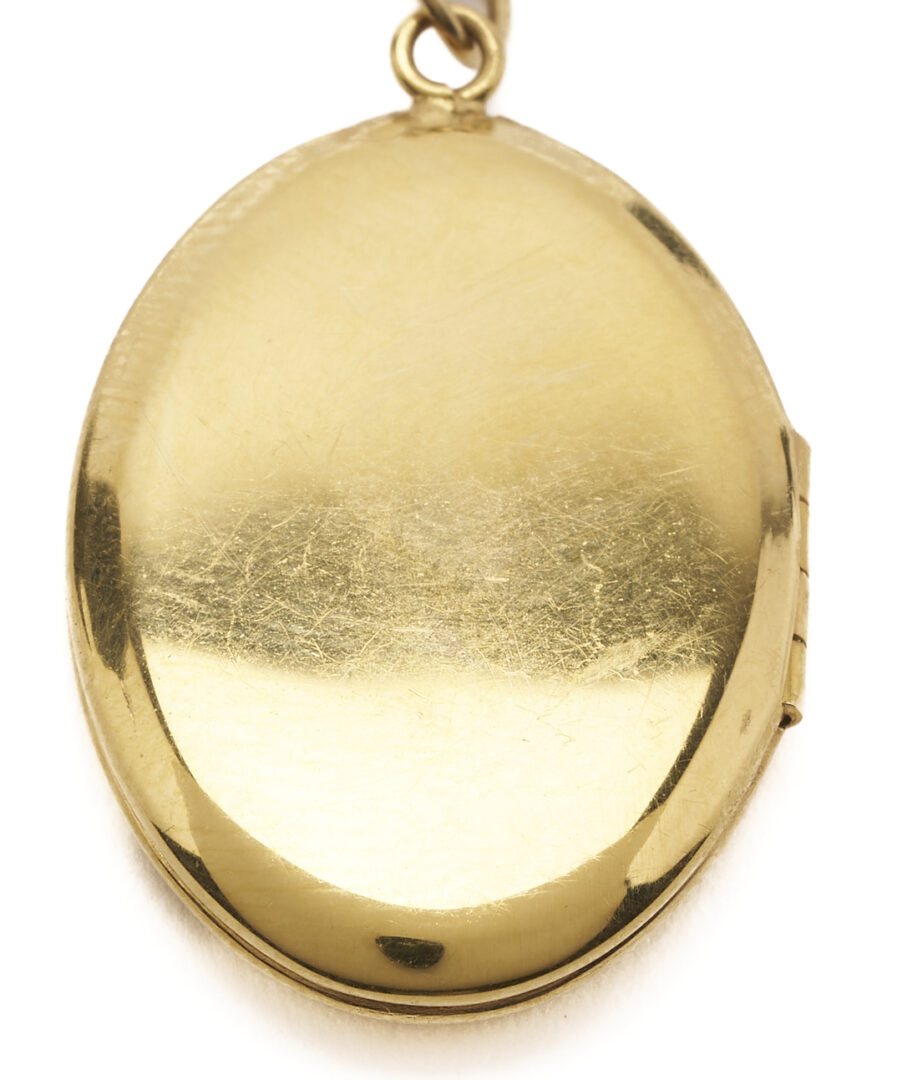 Lot 974: 14K Engraved Locket Necklace
