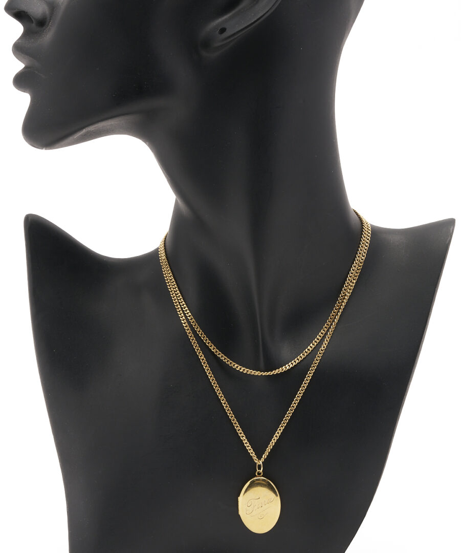 Lot 974: 14K Engraved Locket Necklace