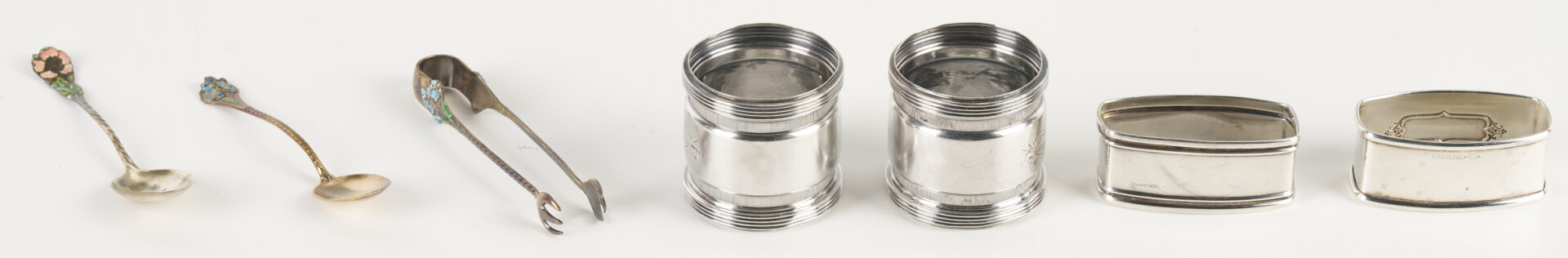 Lot 1010: 8 Antique Sterling Silver Items incl. Enameled Spoons, Napkin Rings