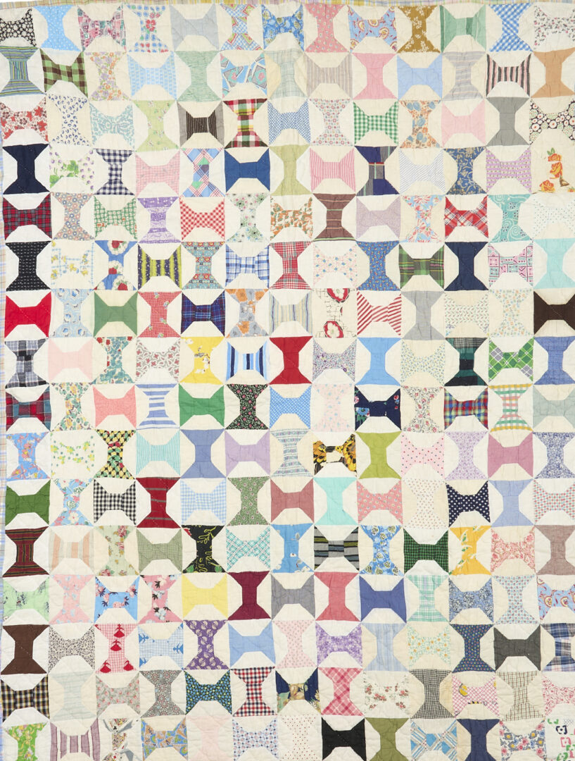 Lot 1060: Two American Pieced Quilts,  Rolling Stone & Spools Patterns