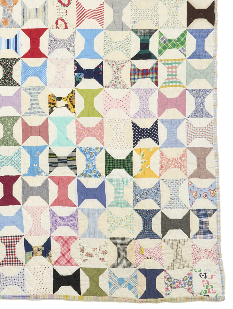 Lot 1060: Two American Pieced Quilts,  Rolling Stone & Spools Patterns