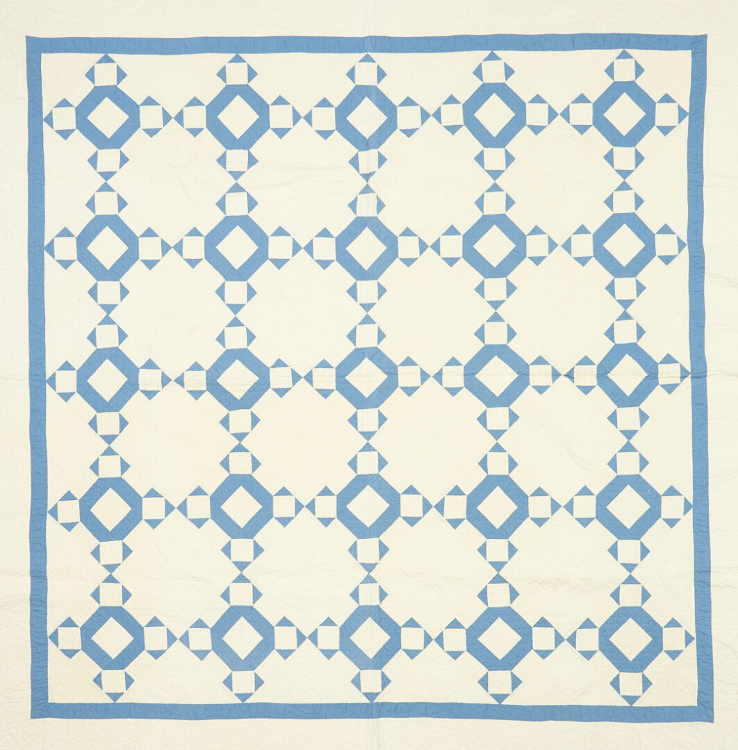 Lot 1060: Two American Pieced Quilts,  Rolling Stone & Spools Patterns