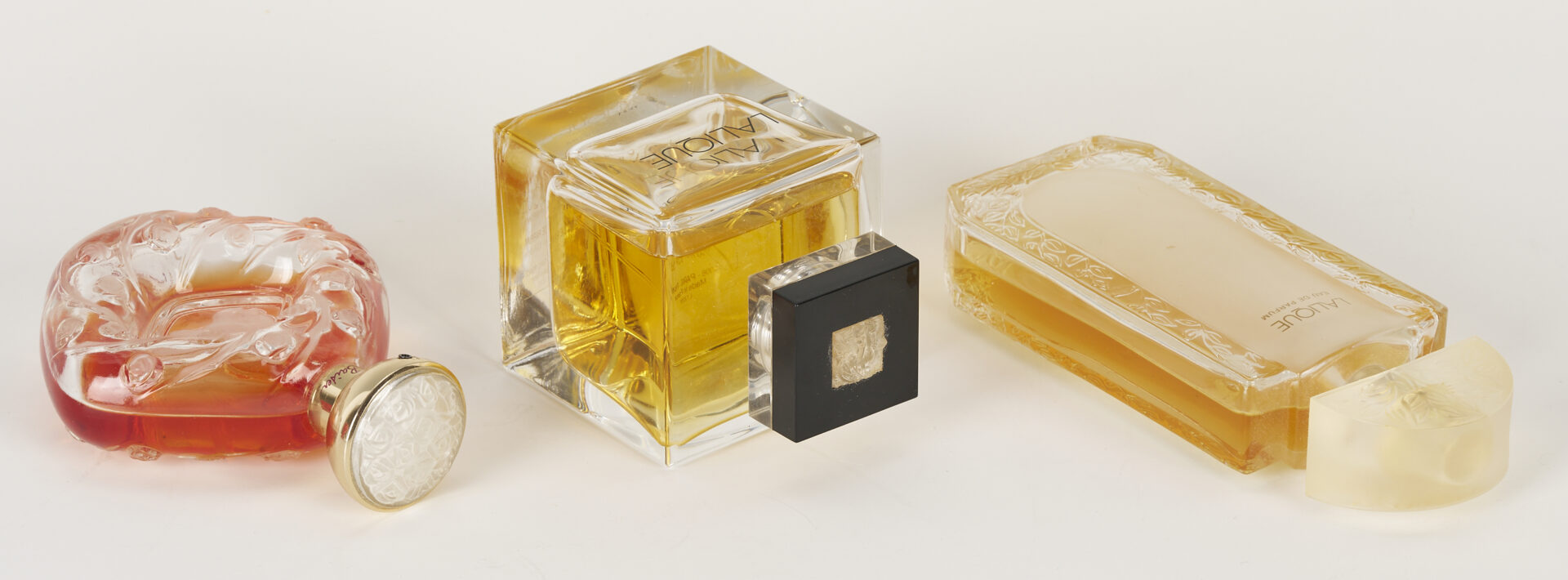 Lot 1074: 4 Lalique Perfume Bottles & 1 Desna Art Glass Vase