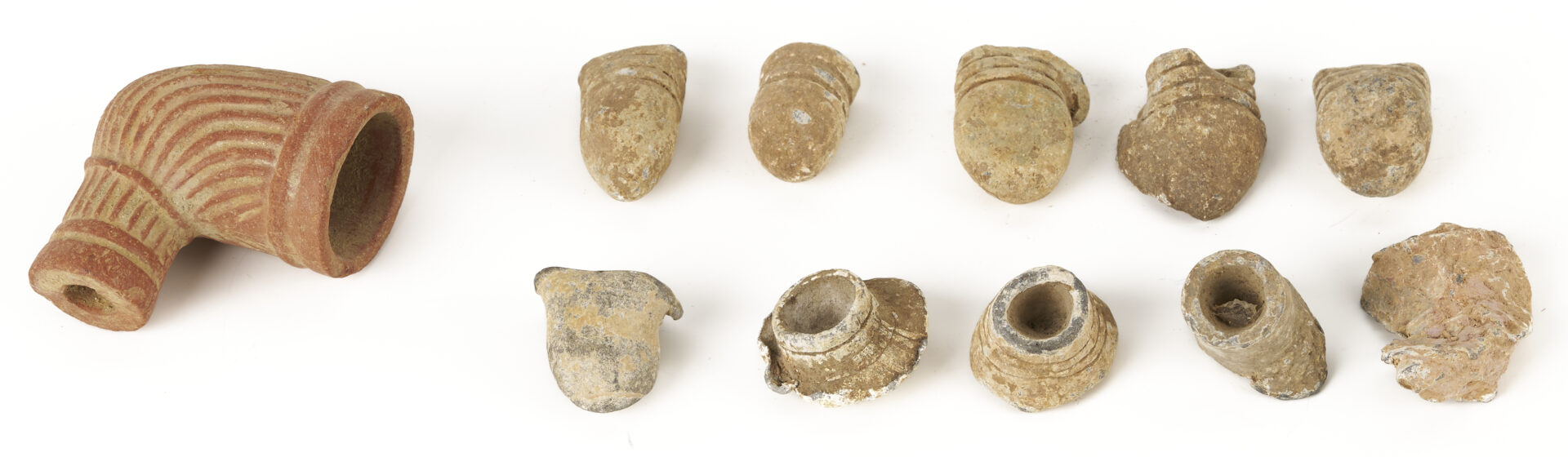 Lot 1084: 2 Newspapers, Relic Revolver, Minie balls and Clay Pipe, Hollybrook Farm, Blount Co.