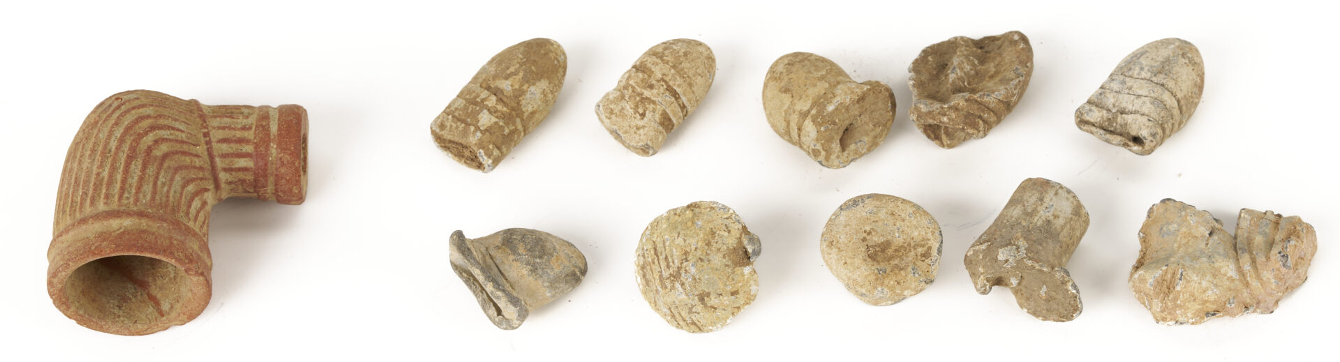 Lot 1084: 2 Newspapers, Relic Revolver, Minie balls and Clay Pipe, Hollybrook Farm, Blount Co.