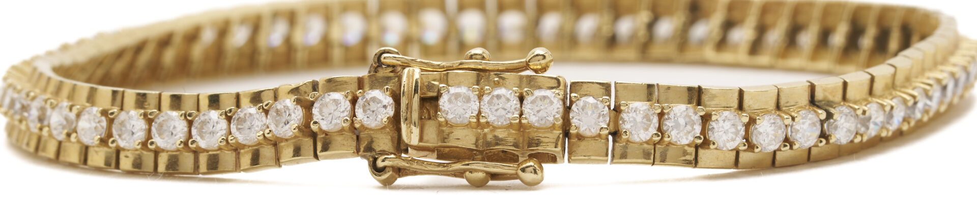 Lot 1232: 14K Gold & CZ Tennis Bracelet