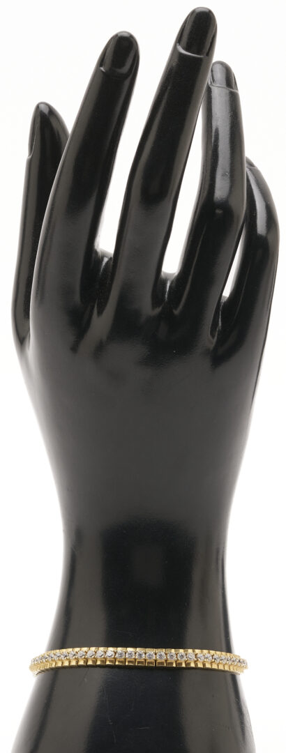 Lot 1232: 14K Gold & CZ Tennis Bracelet