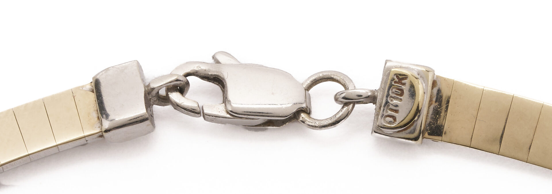 Lot 1235: 10K Gold Double Sided Omega Necklace