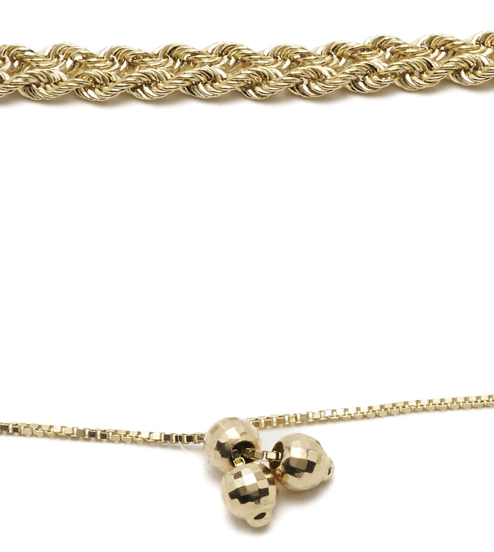 Lot 1237: Two 14K Gold Bracelets – Bangle & Rope