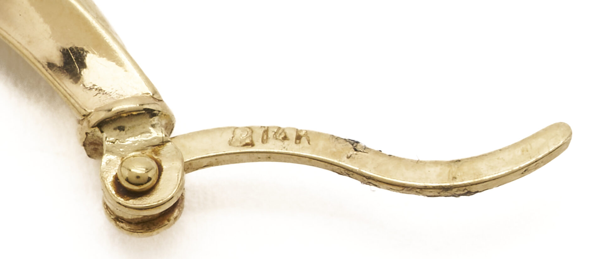 Lot 1238: Two 14K Yellow Gold Hoop Earring Pairs