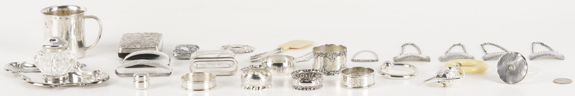 Lot 1298: 25 silver Novelty Items including Baby Silver