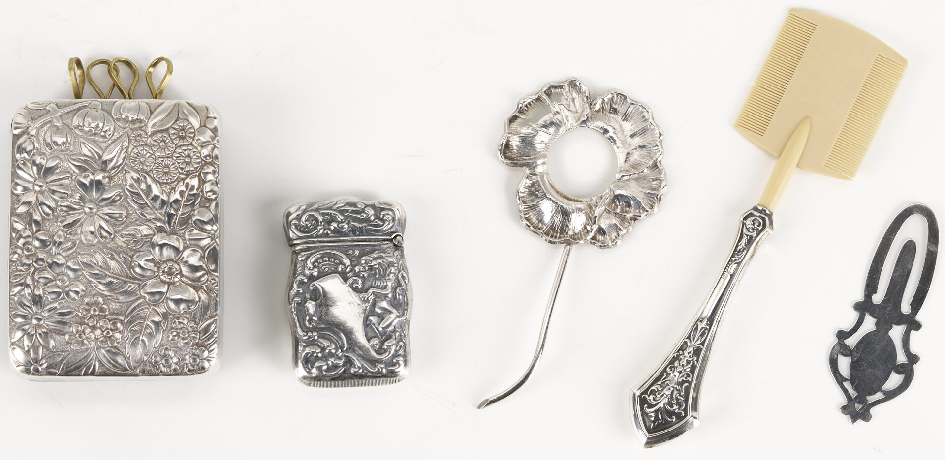 Lot 1298: 25 silver Novelty Items including Baby Silver