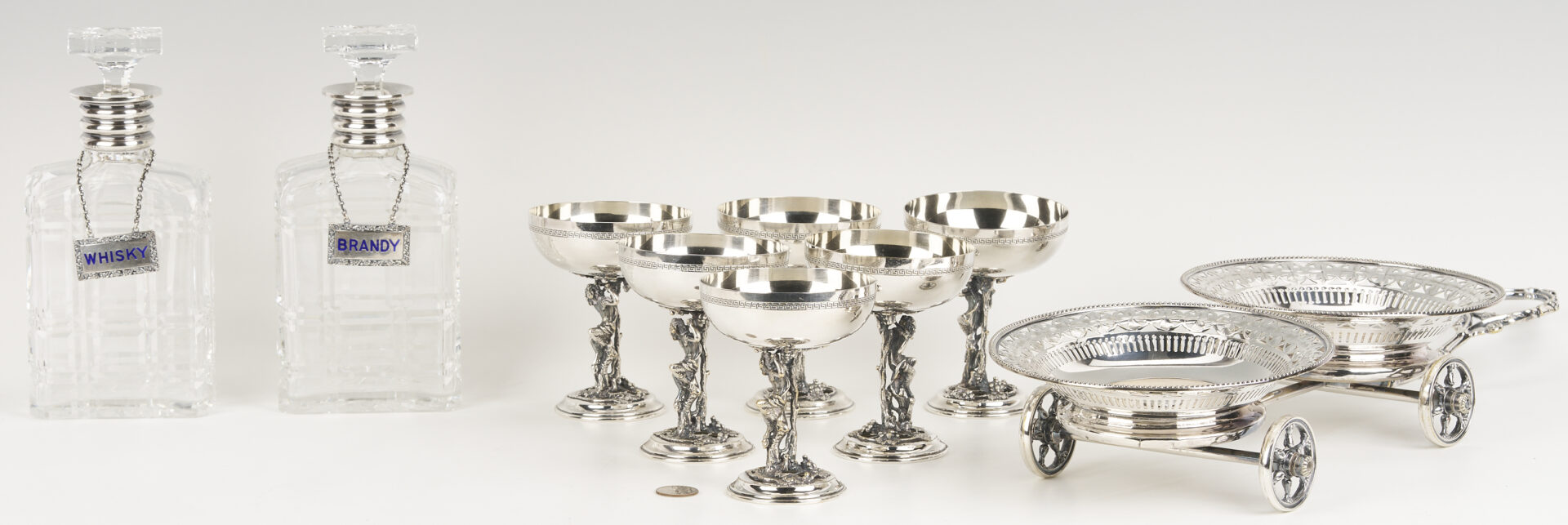 Lot 1308: 9 Bar Items: Wine Coaster Wagon, 6 Goblets, 2 Decanters