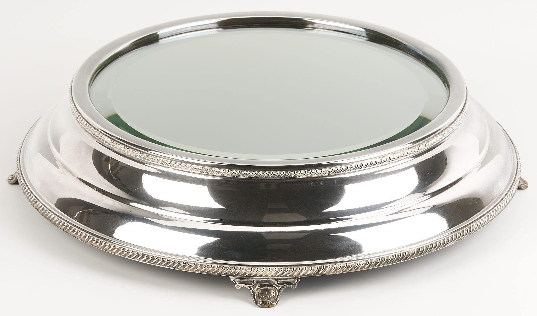 Lot 1311: Round Mirrored Silverplated Plateau