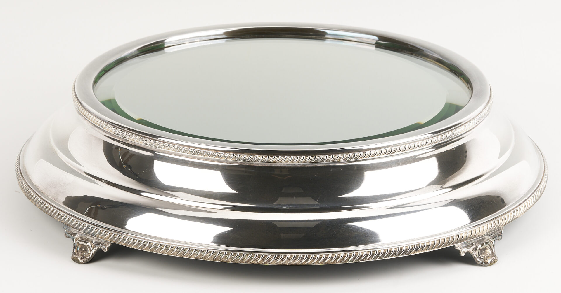 Lot 1311: Round Mirrored Silverplated Plateau