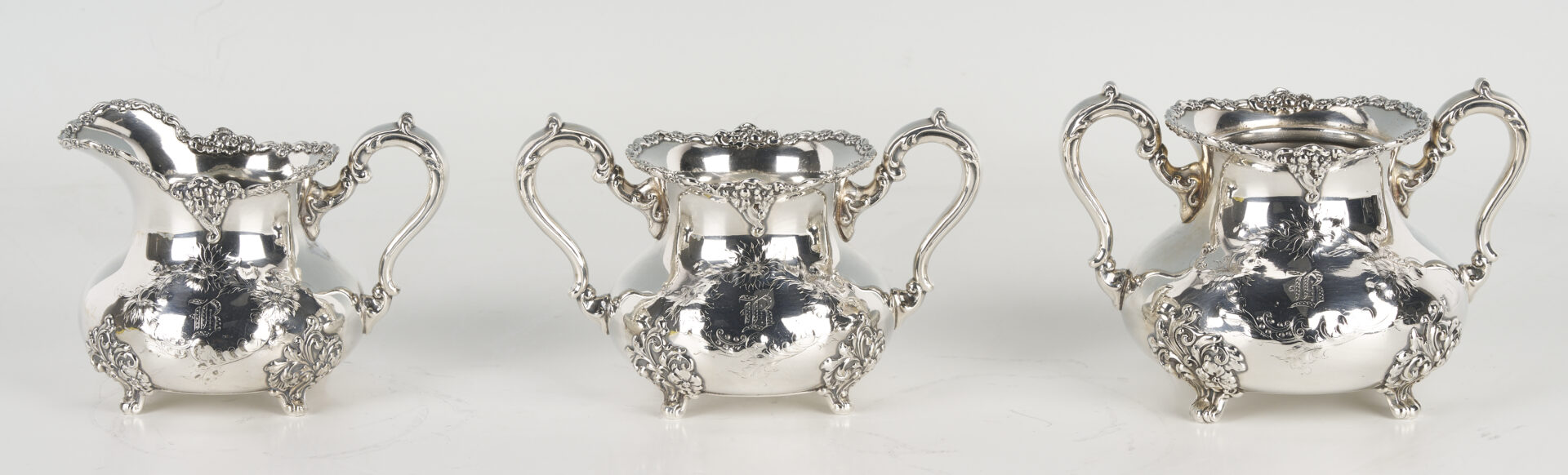 Lot 1313: 5 Piece Pairpoint Silverplated Tea Service Plus Alpadur Silverplate Mirror