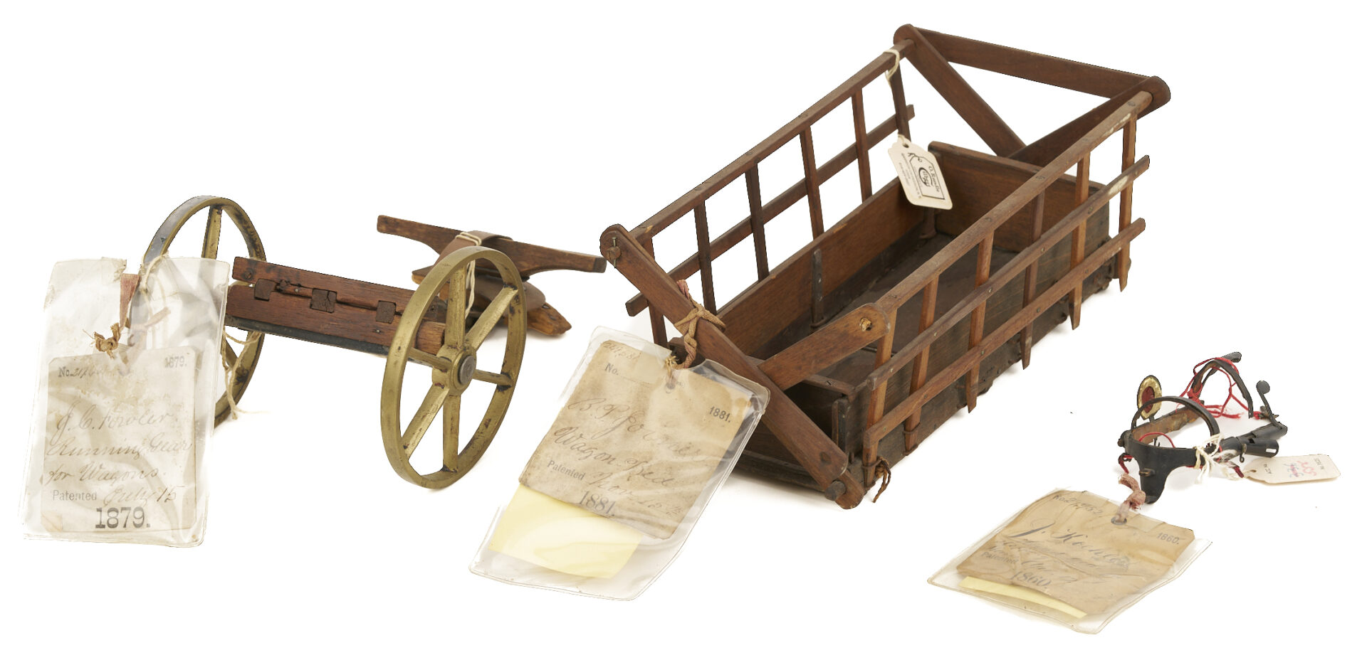 Lot 218: Eight US Patent Models; Horses & Wagons