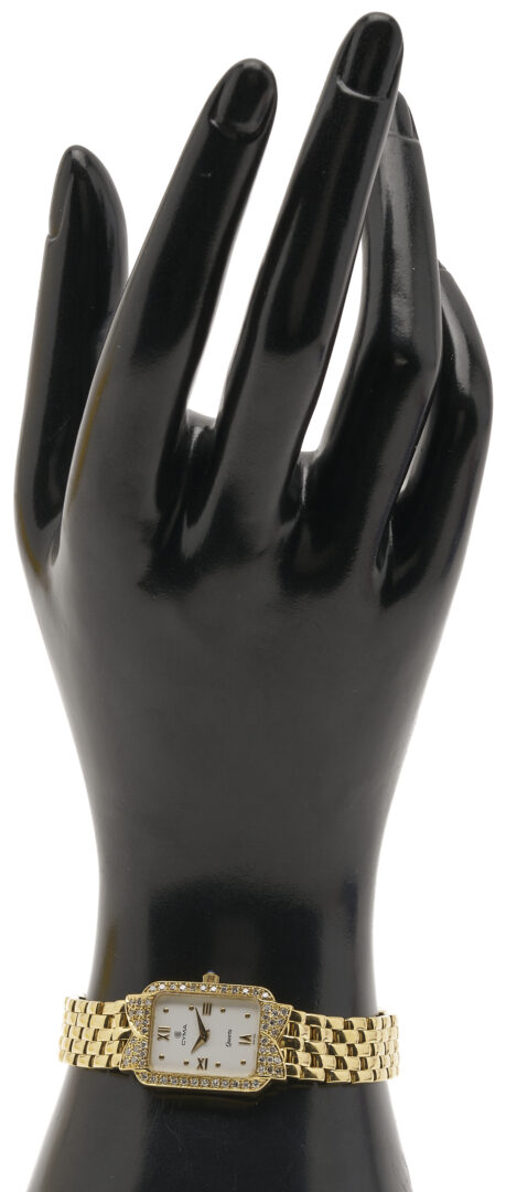 Lot 310: 18K Gold & Diamond CYMA Lady’s Watch