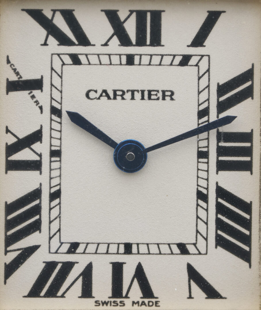 Lot 312: Ladies’ Cartier 18K Tank Watch