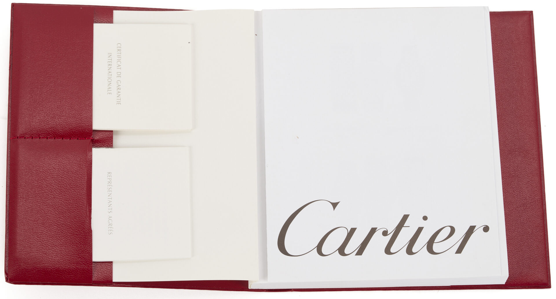 Lot 312: Ladies’ Cartier 18K Tank Watch