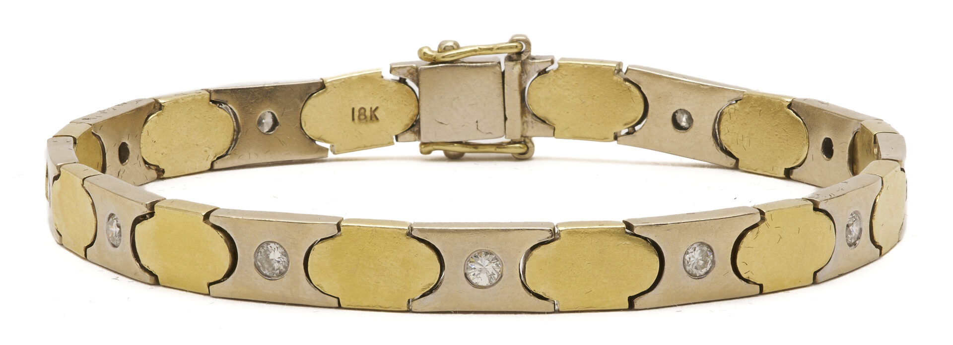 Lot 316: 18K Gold & Diamond X and O Bracelet