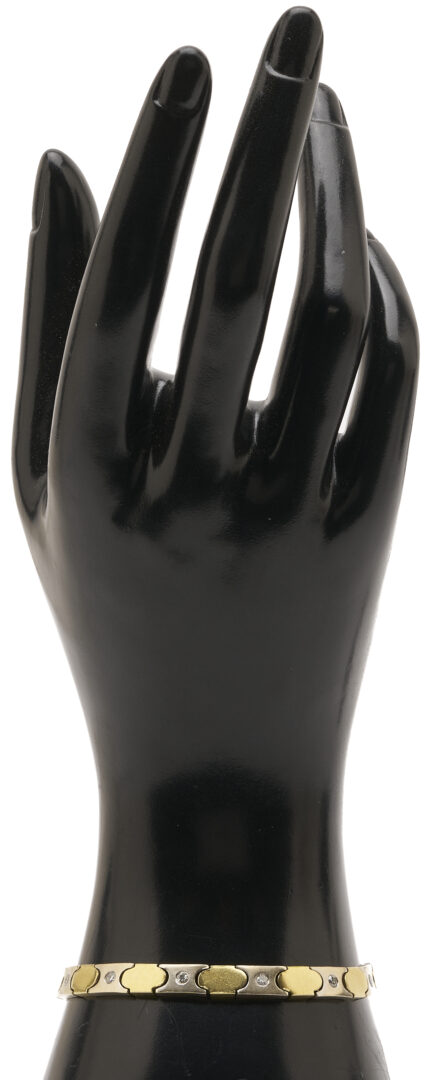 Lot 316: 18K Gold & Diamond X and O Bracelet