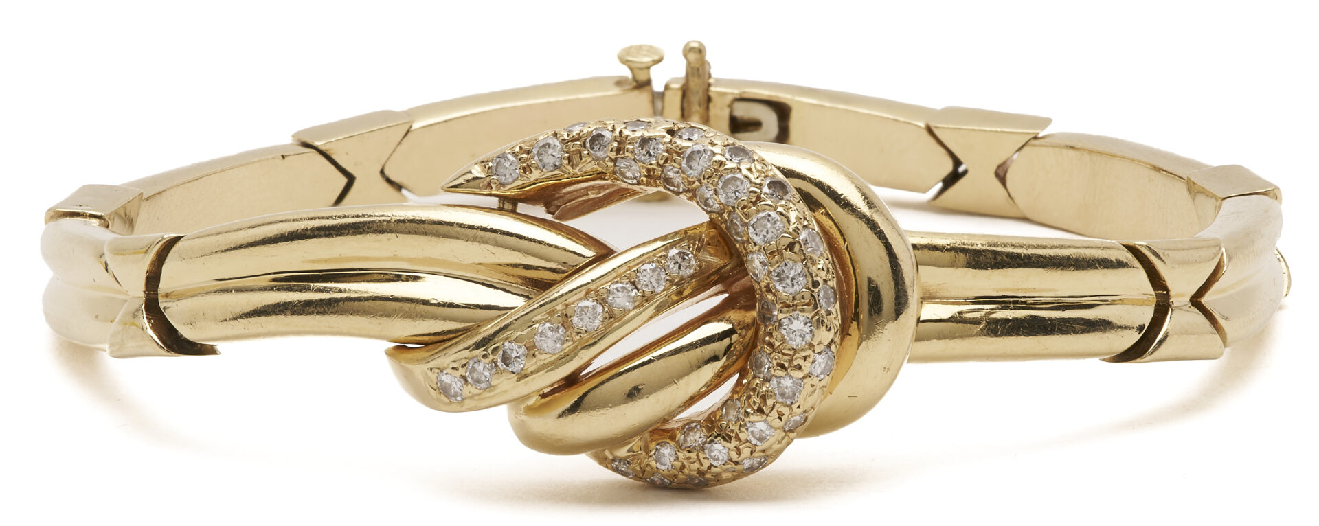 Lot 321: 14K Gold & Diamond Knot Bracelet
