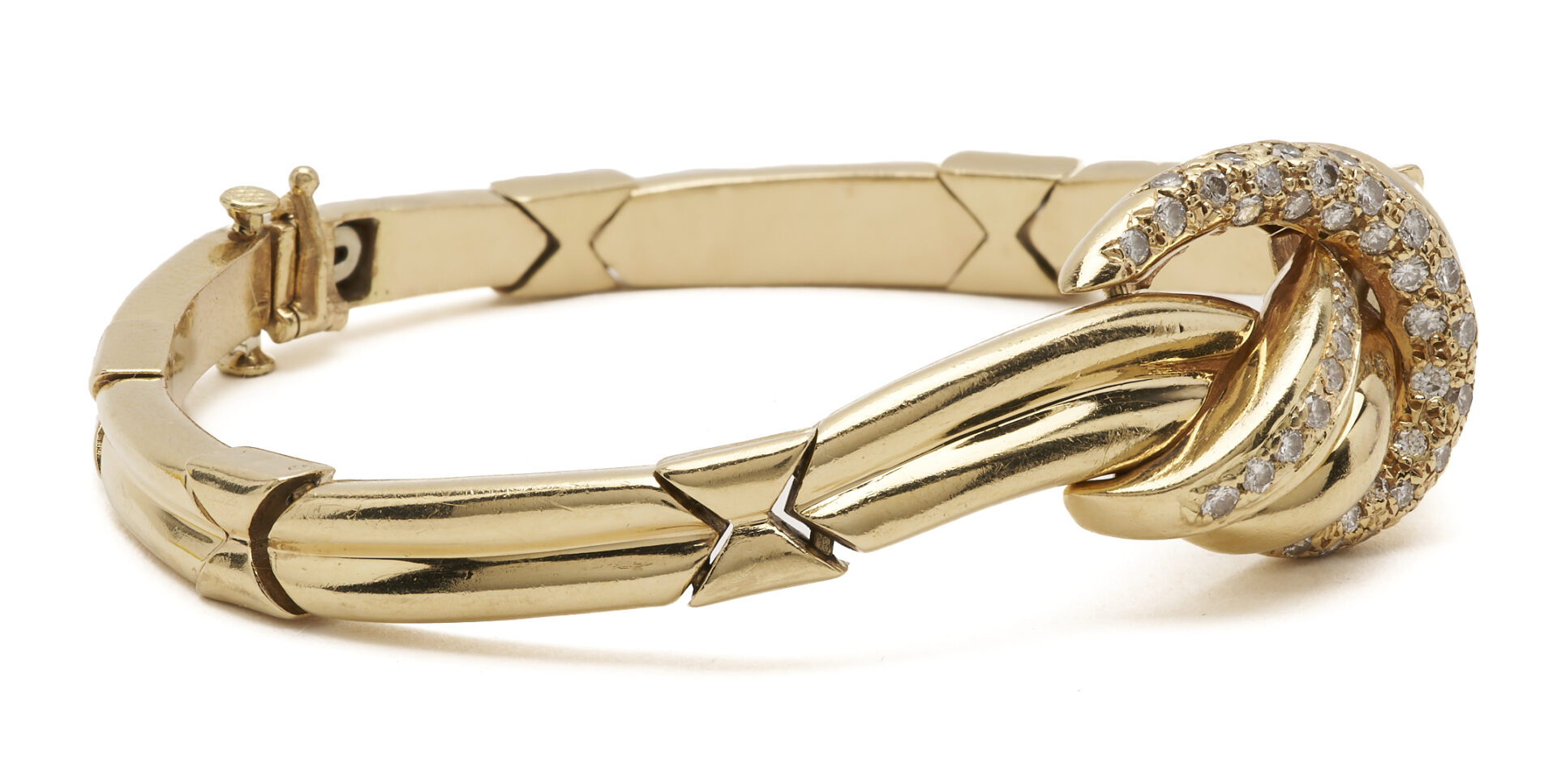 Lot 321: 14K Gold & Diamond Knot Bracelet