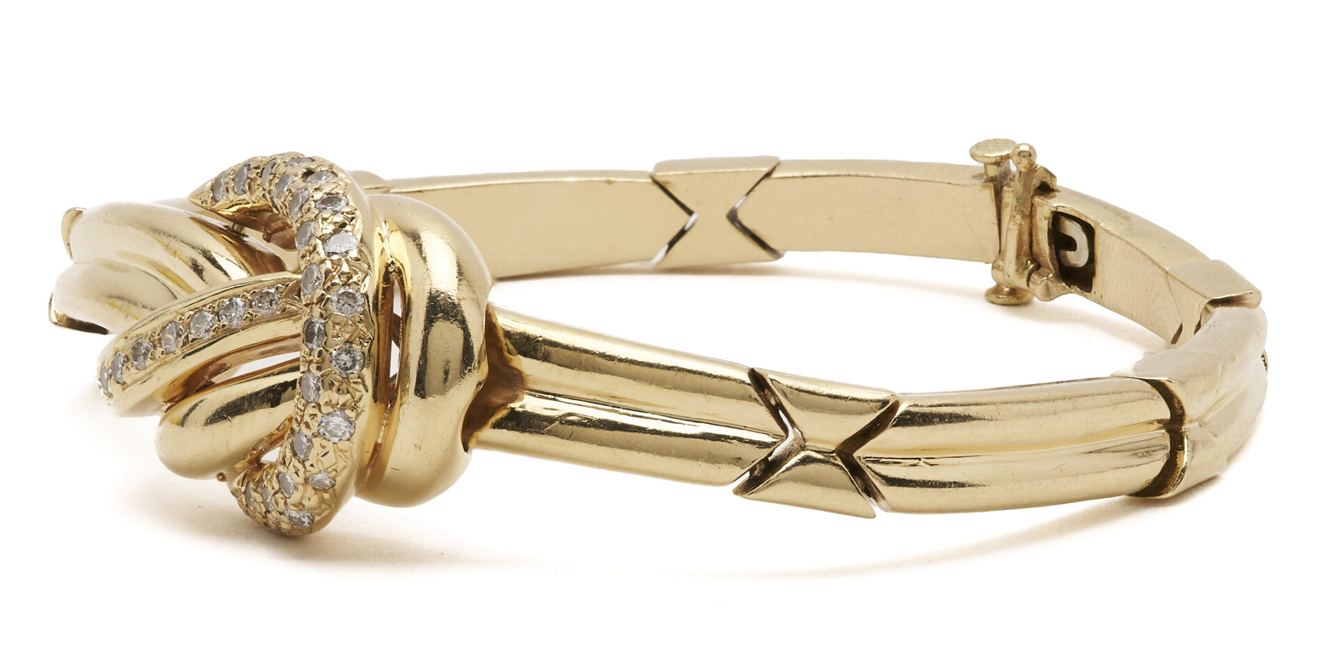 Lot 321: 14K Gold & Diamond Knot Bracelet