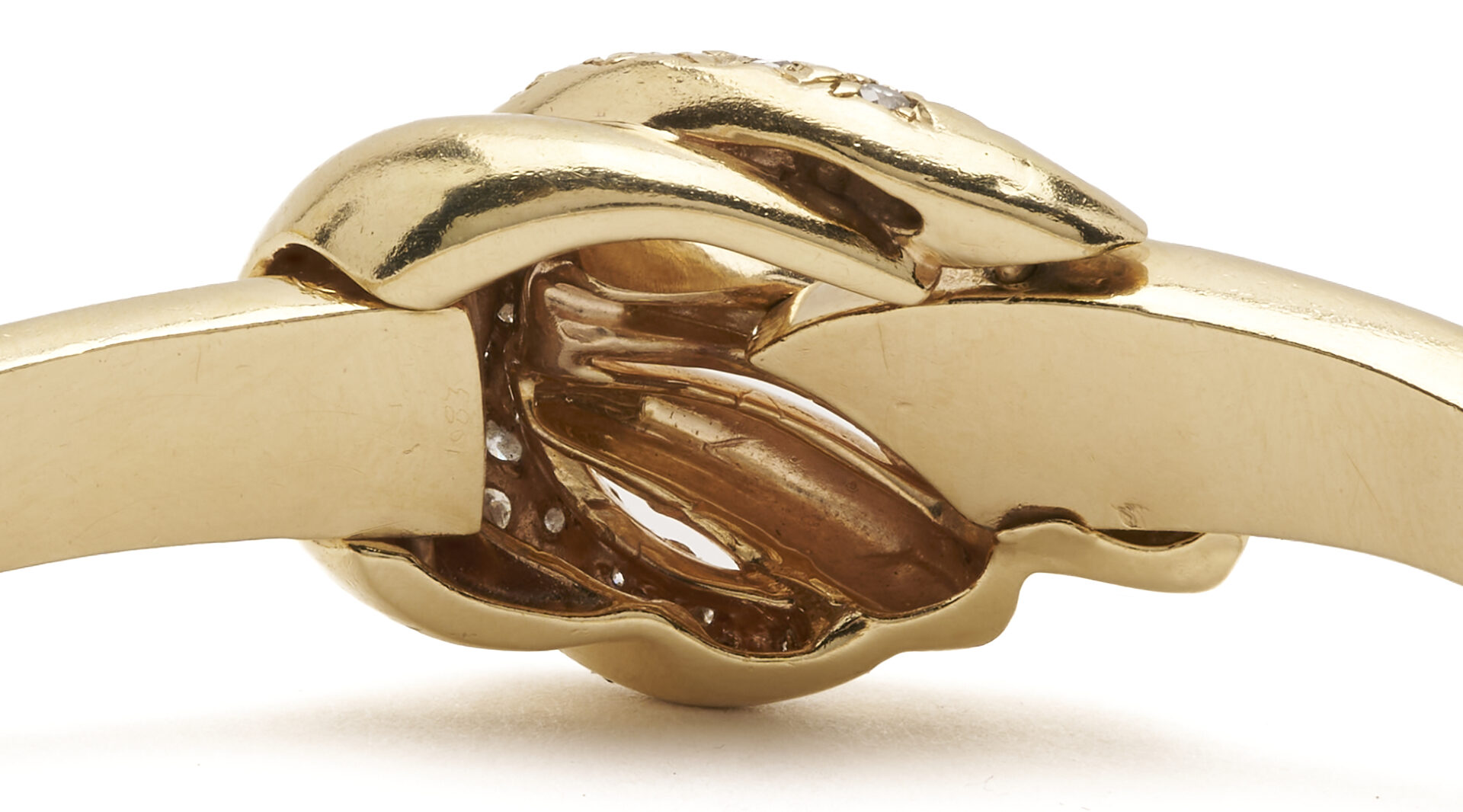 Lot 321: 14K Gold & Diamond Knot Bracelet