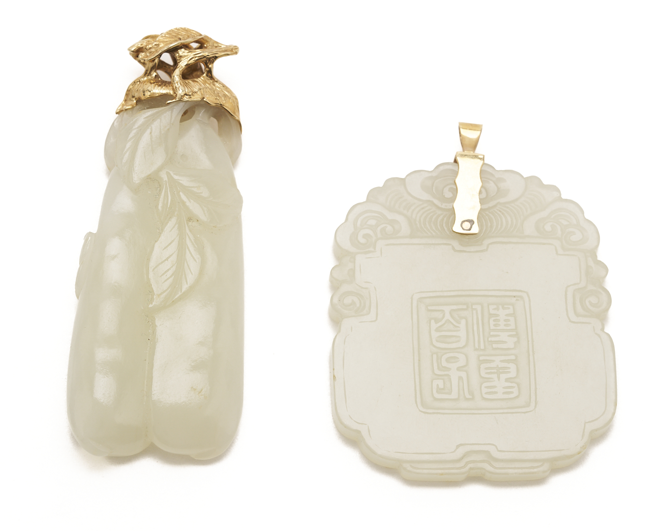 Lot 36: 7 Gold & Carved Nephrite Jade Pendants