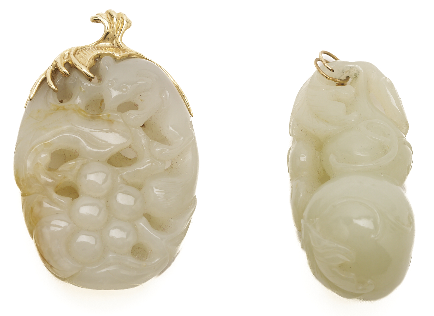 Lot 36: 7 Gold & Carved Nephrite Jade Pendants