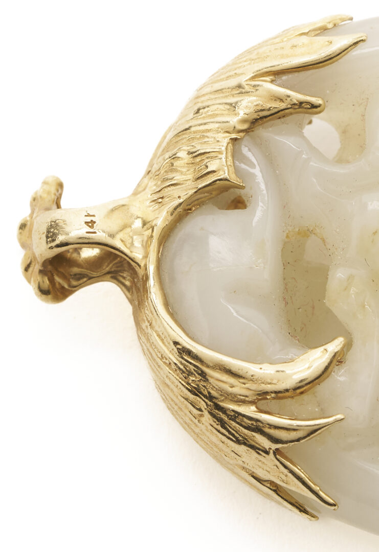 Lot 36: 7 Gold & Carved Nephrite Jade Pendants