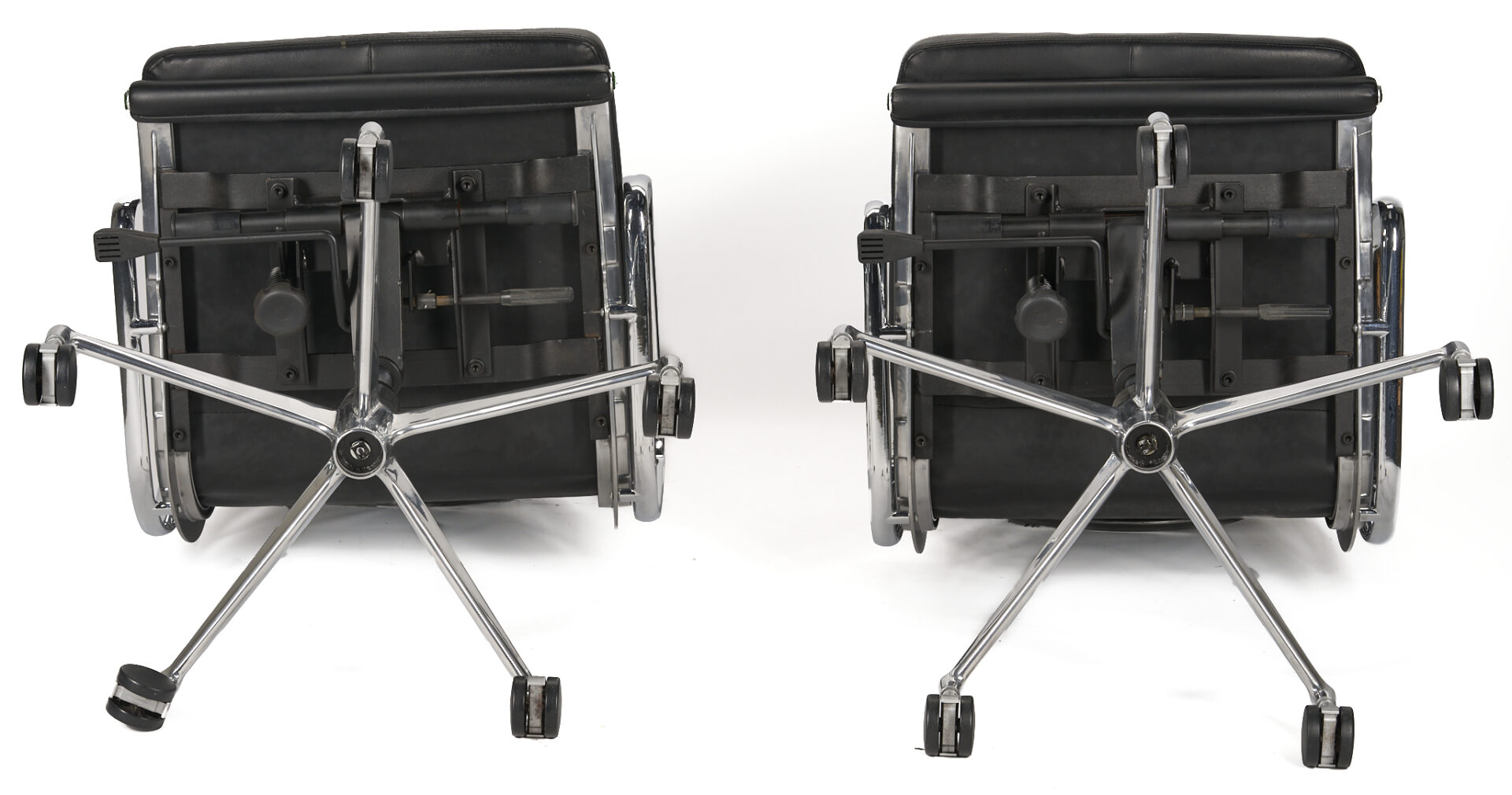 Lot 395: Pair of Eames/Herman Miller  Soft Pad Low Back Arm Chairs