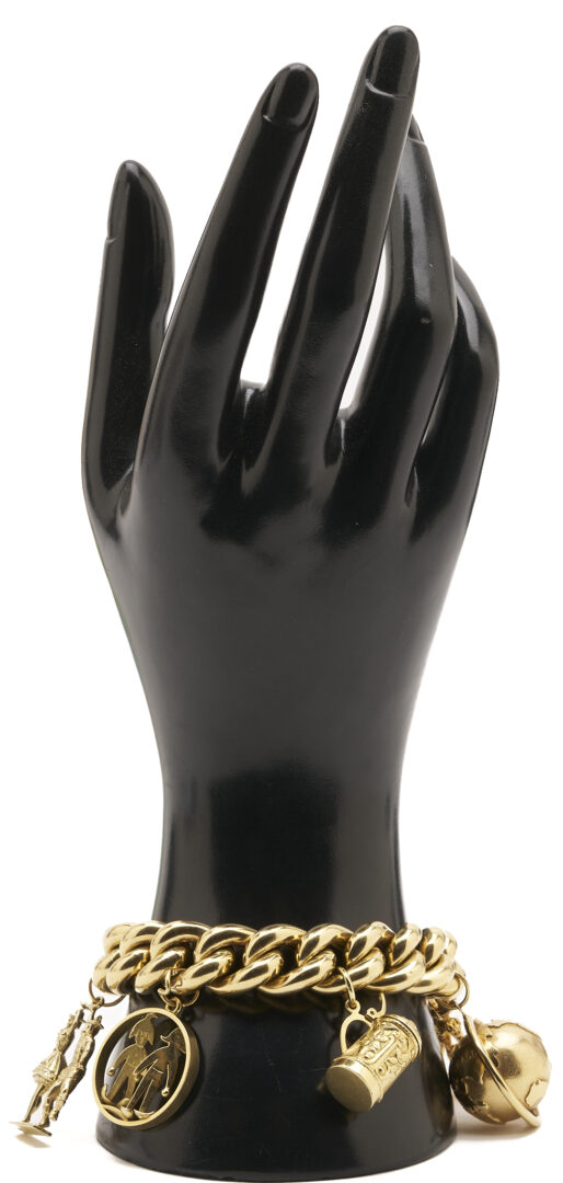 Lot 40: 18K Gold Charm Bracelet