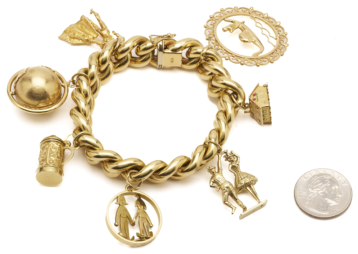 Lot 40: 18K Gold Charm Bracelet
