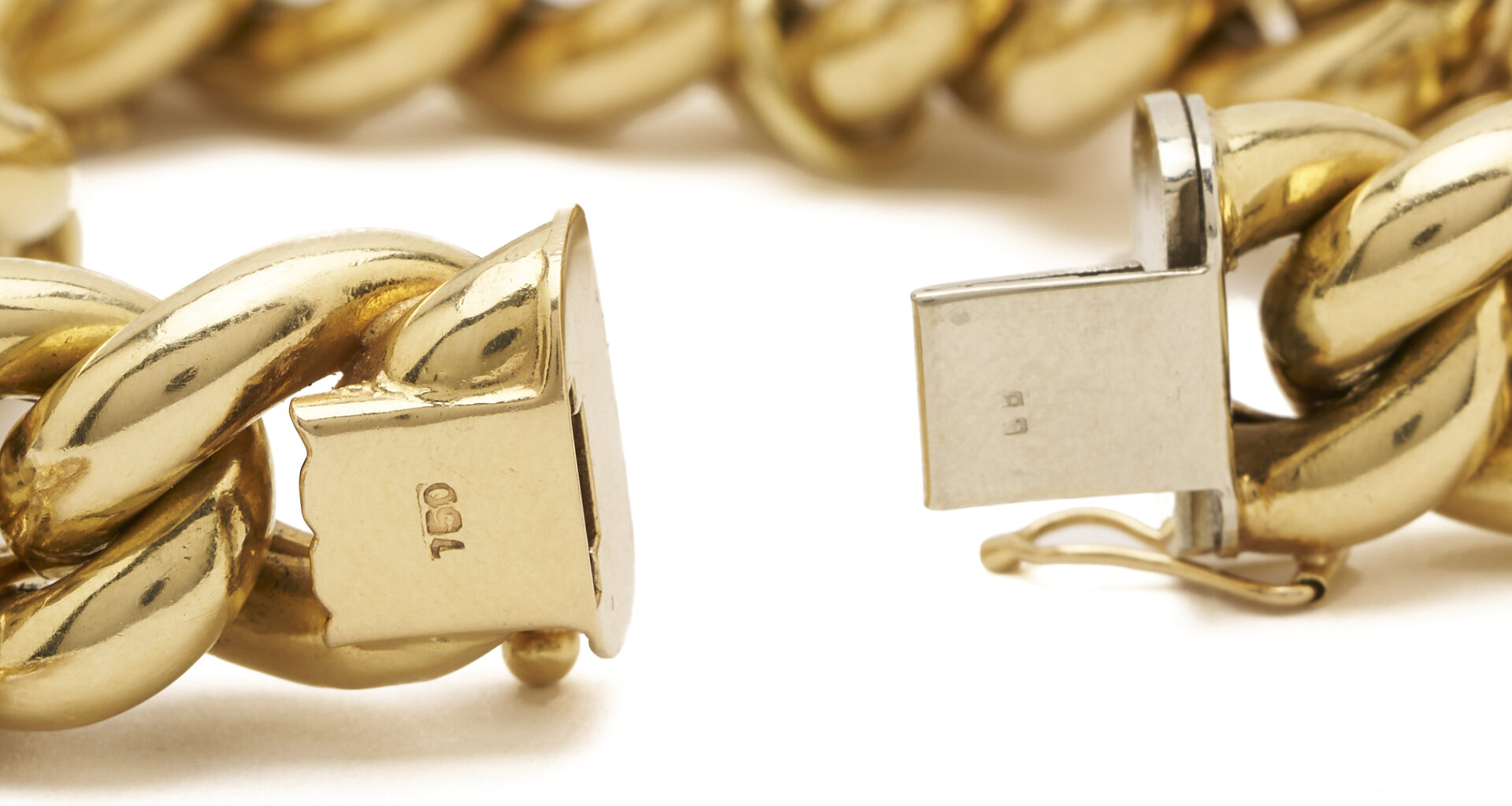 Lot 40: 18K Gold Charm Bracelet