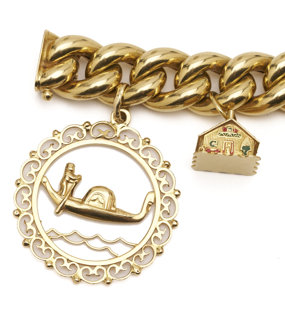 Lot 40: 18K Gold Charm Bracelet