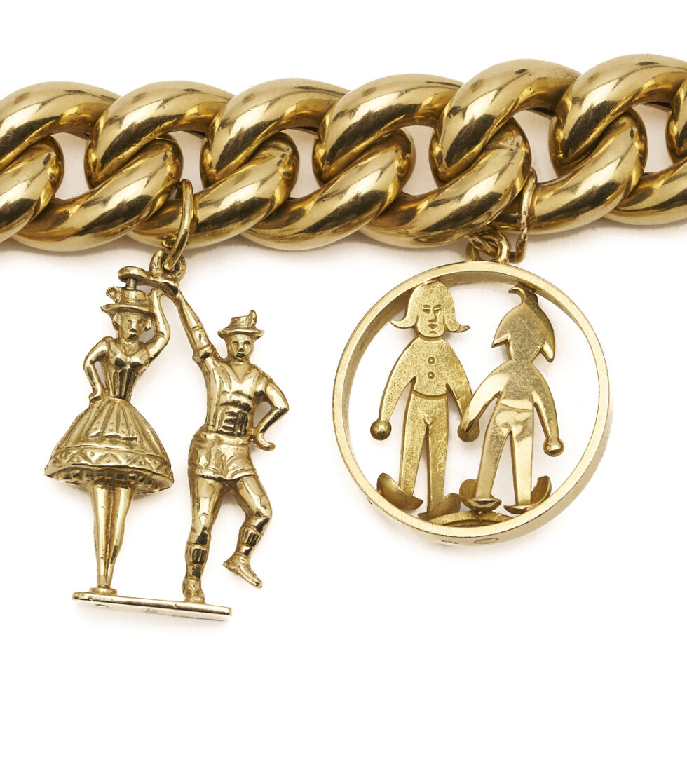 Lot 40: 18K Gold Charm Bracelet