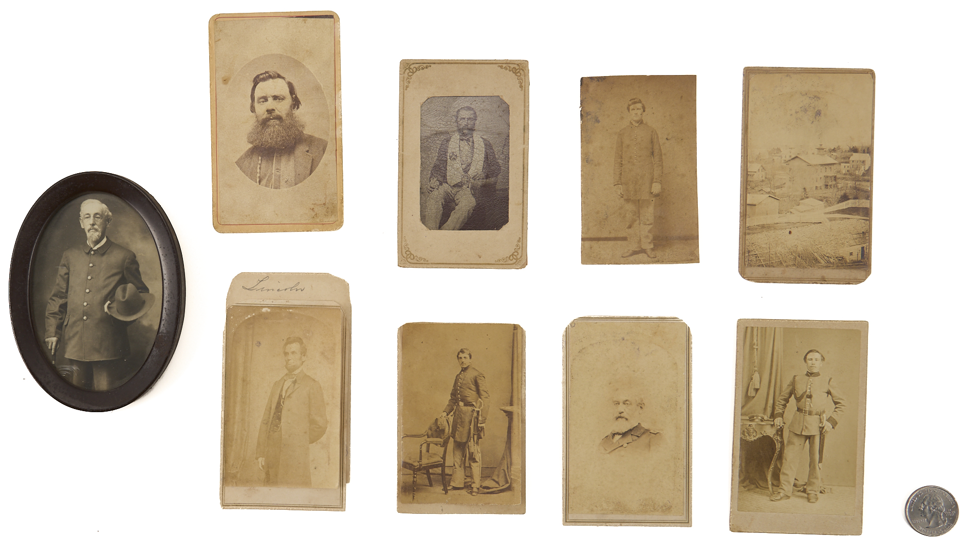 Lot 502: 9 19th Cent. Photos, incl. Brady Lincoln CDV, Akron OH