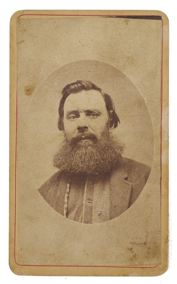 Lot 502: 9 19th Cent. Photos, incl. Brady Lincoln CDV, Akron OH